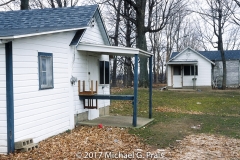 MIgrant Camp: Chair on Porch