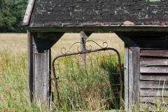 Broken Gate on Farm Building